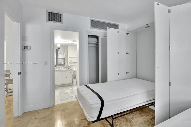 9801 Collins Ave Unit 3T, Bal Harbour, FL 33154 - bedroom with visible vents, ensuite bath, and a closet