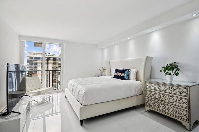 bedroom with light tile patterned floors