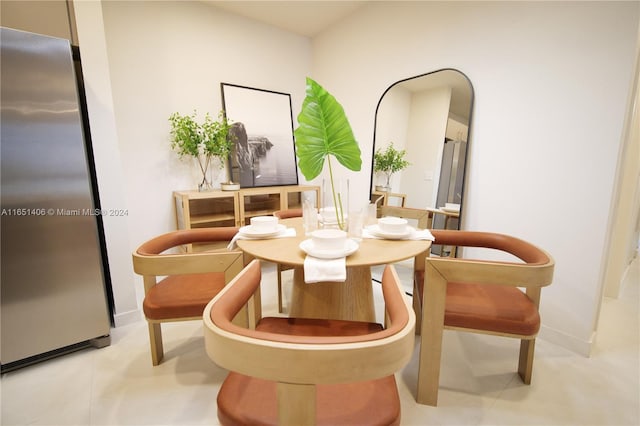 dining room featuring light tile patterned floors