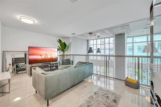 living room with floor to ceiling windows