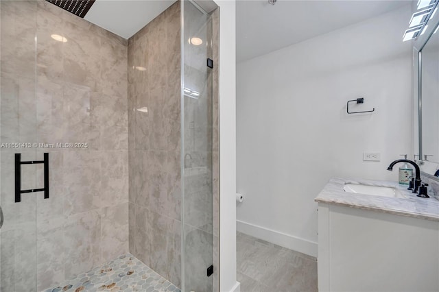 bathroom featuring vanity and walk in shower