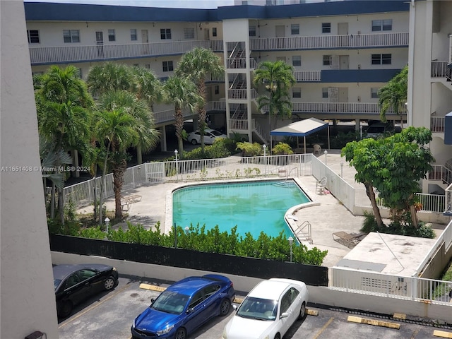 view of pool featuring central AC unit