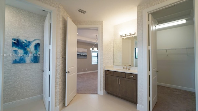 bathroom featuring tile patterned floors and vanity