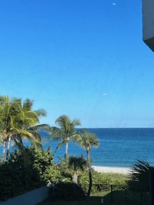 property view of water featuring a beach view