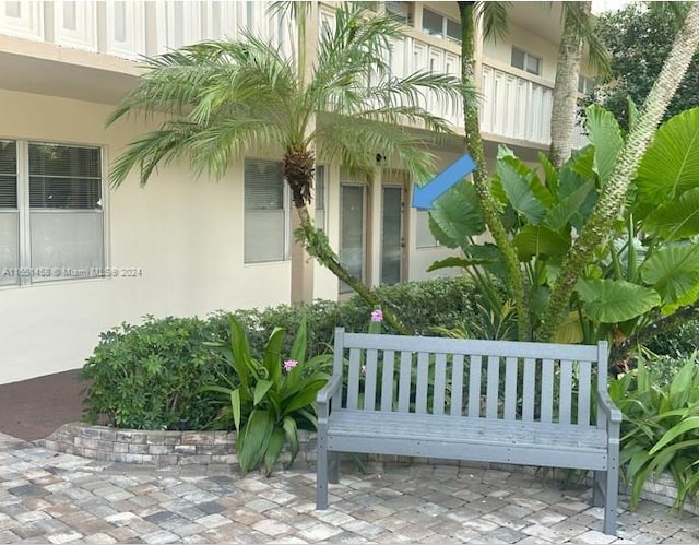 doorway to property featuring a balcony