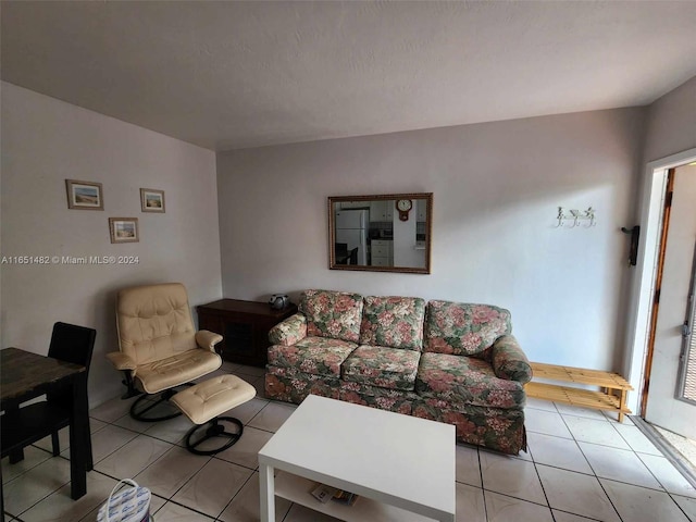 living room with light tile patterned flooring