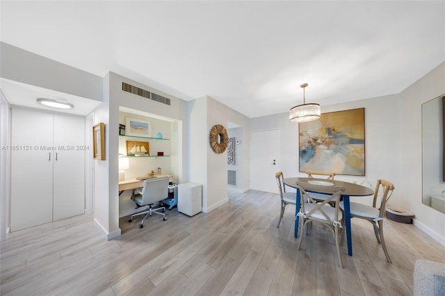 dining area with light wood-type flooring