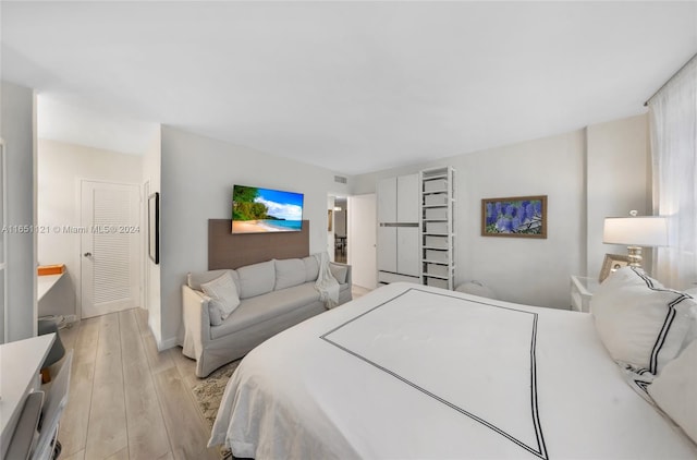 bedroom featuring light hardwood / wood-style floors