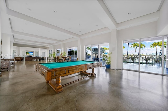 recreation room with billiards, beam ceiling, and concrete floors