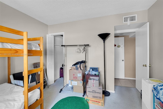 bedroom with a textured ceiling