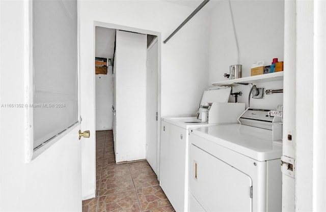 laundry area with washer and dryer