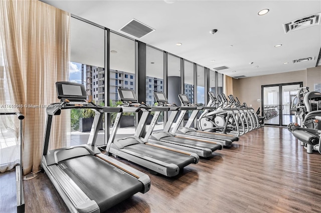 5252 NW 85th Ave Unit 1909, Doral, FL 33166 - exercise room with wood finished floors and recessed lighting