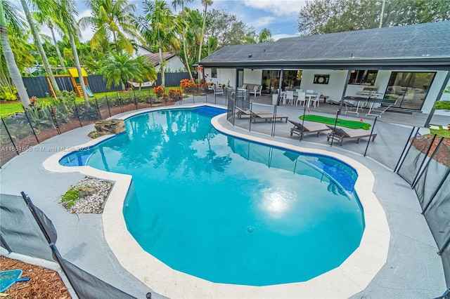 view of pool featuring a patio area