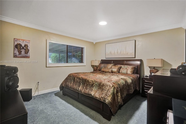 bedroom with crown molding and carpet floors