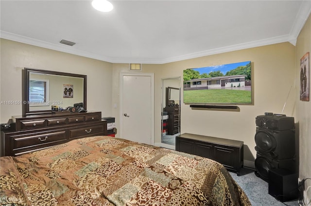 carpeted bedroom with crown molding