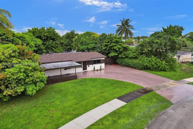 770 NW 175th Dr, Miami Gardens, FL 33169 - ranch-style house featuring a front lawn, driveway, and stucco siding