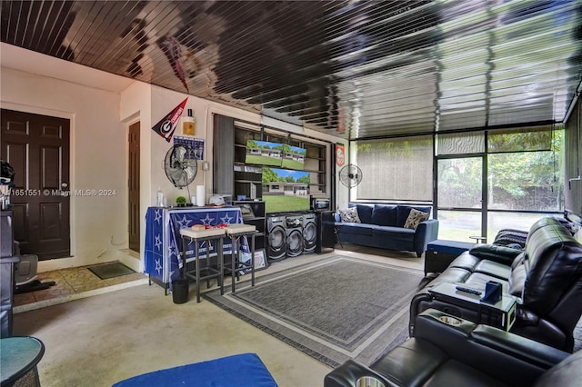 living room featuring concrete flooring