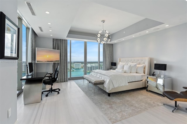 bedroom featuring a wall of windows, visible vents, a tray ceiling, recessed lighting, and access to outside