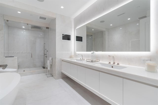 full bathroom featuring a sink, visible vents, and a stall shower