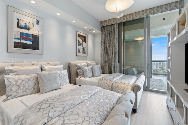 bedroom featuring access to exterior, light tile patterned floors, and recessed lighting