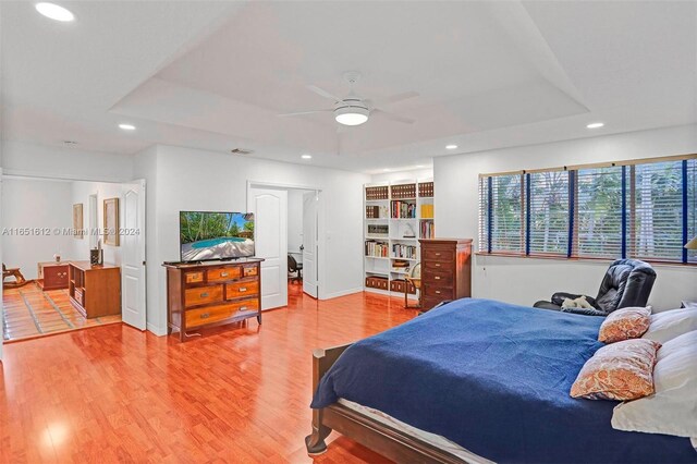 living room with ceiling fan and tile patterned flooring