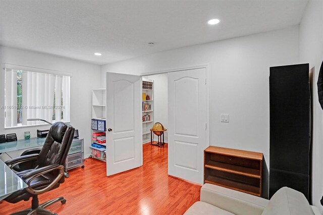 bedroom featuring ceiling fan and hardwood / wood-style flooring