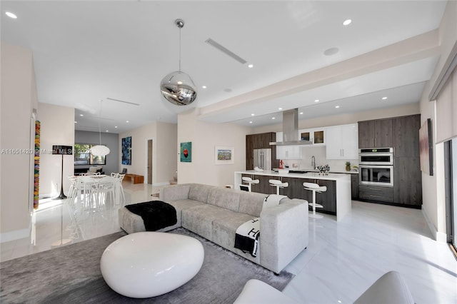 living room featuring sink