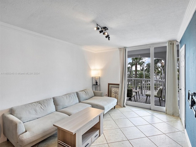 tiled living room featuring a textured ceiling and crown molding