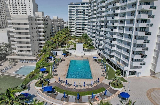 view of swimming pool featuring a patio