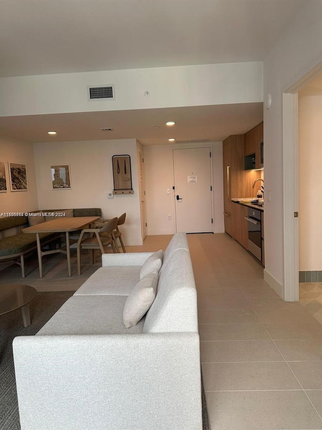 601 NE 1 St Ave Unit 3513, Florida City, FL 33132 - living area featuring light tile patterned flooring, visible vents, recessed lighting, and baseboards