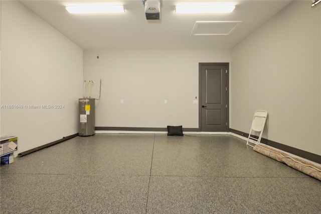 garage with water heater and a garage door opener