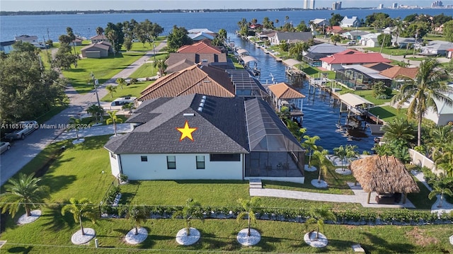 bird's eye view with a water view