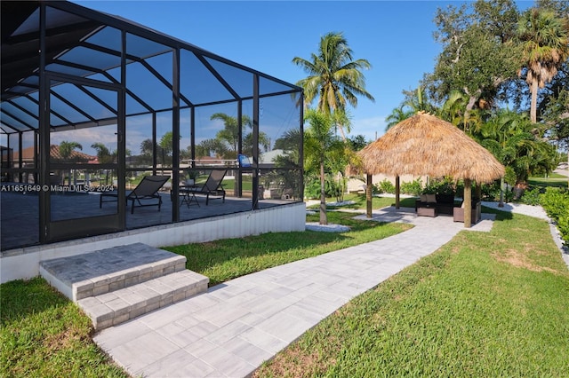 surrounding community with a lawn and a gazebo