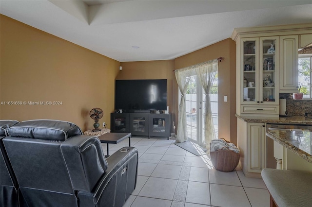 living room featuring light tile patterned flooring