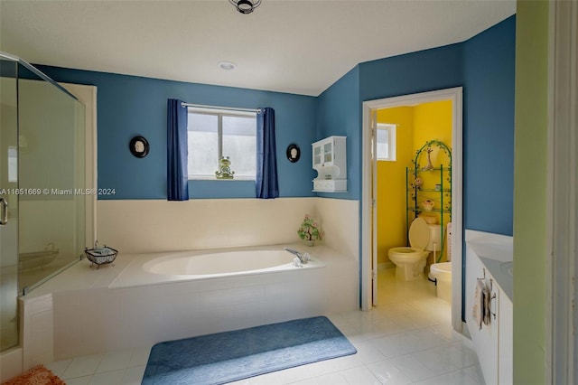 full bathroom featuring tile patterned flooring, vanity, toilet, and plus walk in shower