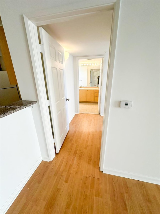 hall featuring light hardwood / wood-style flooring