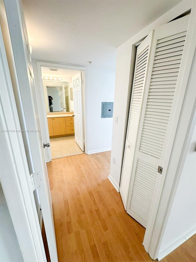 corridor featuring light hardwood / wood-style floors