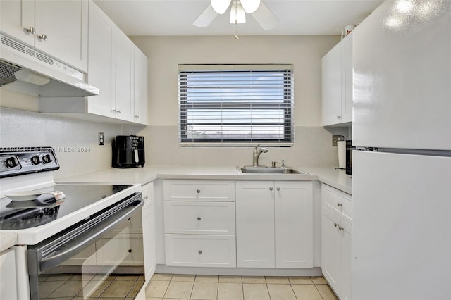 kitchen with stainless steel electric range, white cabinets, sink, white fridge, and ceiling fan