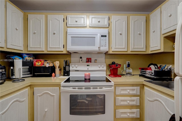 kitchen with white appliances