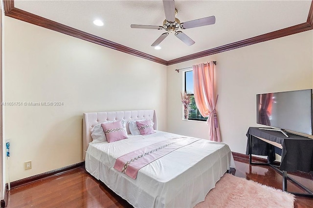 bedroom with ornamental molding, dark hardwood / wood-style floors, and ceiling fan