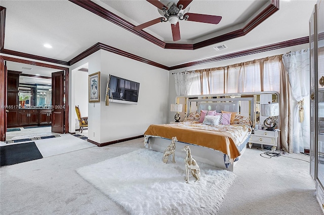 bedroom with ceiling fan, light colored carpet, and crown molding