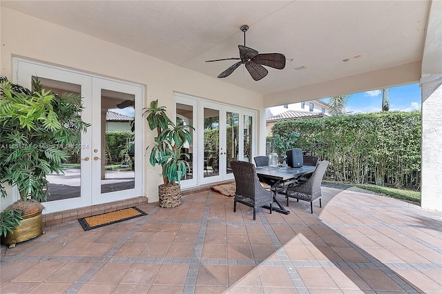 exterior space featuring a wealth of natural light, ceiling fan, and french doors