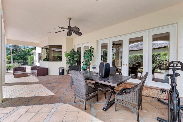 view of patio featuring ceiling fan and french doors