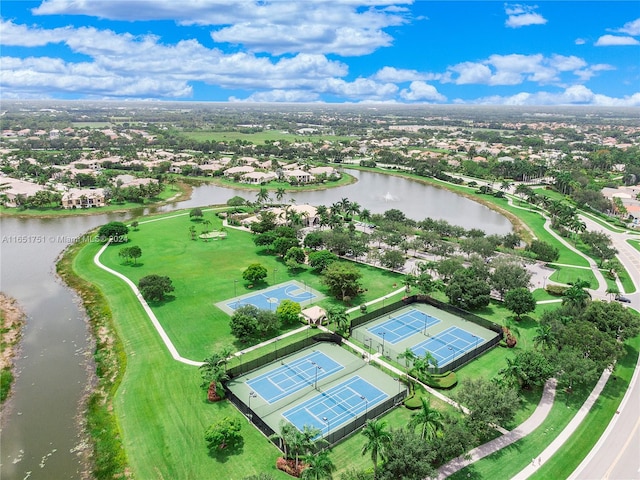 drone / aerial view with a water view