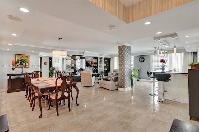 dining space with a notable chandelier