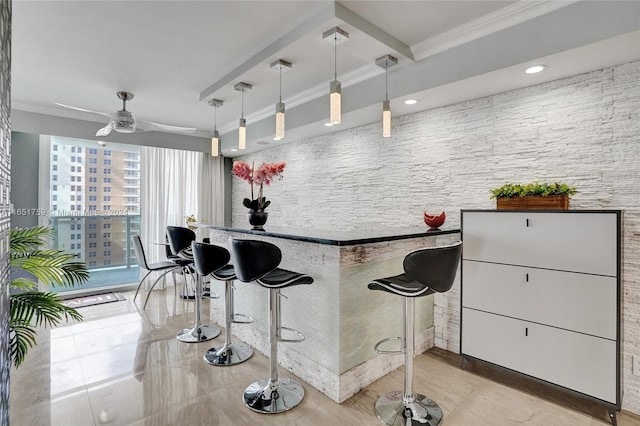 bar featuring ceiling fan and decorative light fixtures