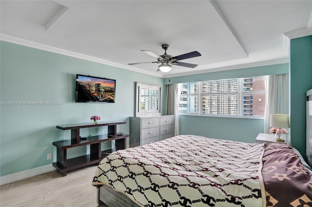 bedroom with crown molding and ceiling fan