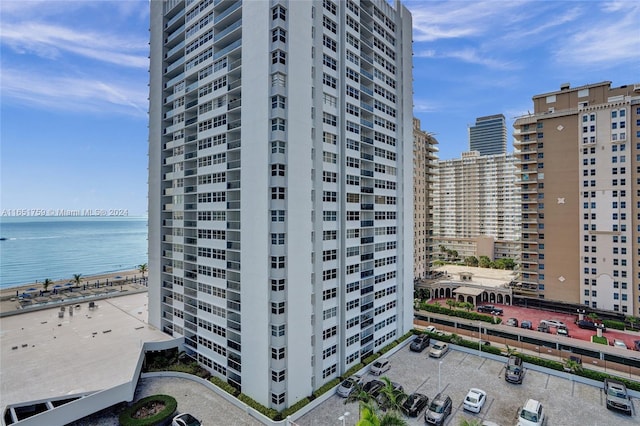 view of building exterior featuring a water view