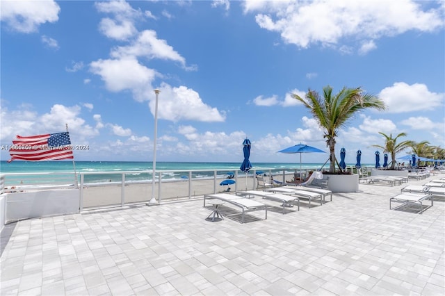 1880 S Ocean Dr Unit Ts106, Hallandale Beach, FL 33009 - view of patio / terrace featuring a water view and a beach view