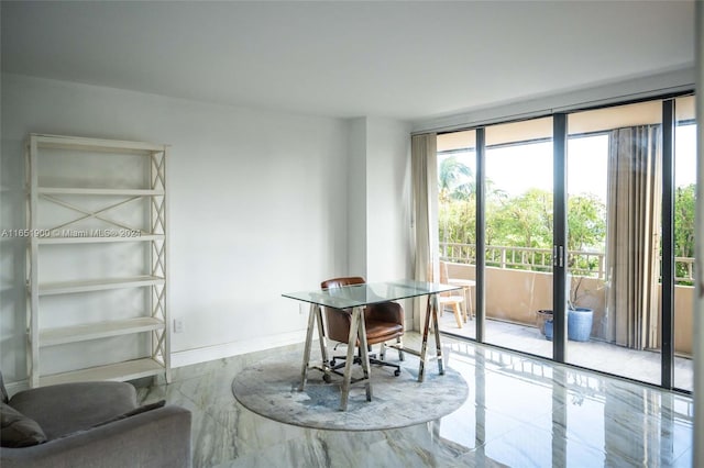 dining room with french doors, a healthy amount of sunlight, and expansive windows